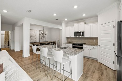 Located on a builder-designated premium lot in the more private - photo 14