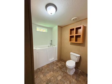 Charming 2BR/2BA home on .41 acres featuring owned solar panels - photo 17
