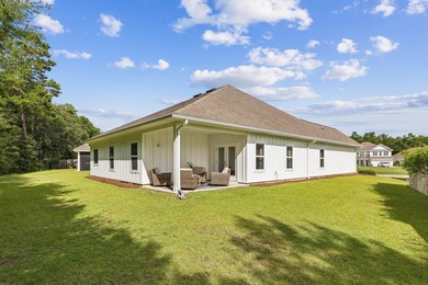 Located on a builder-designated premium lot in the more private - photo 19