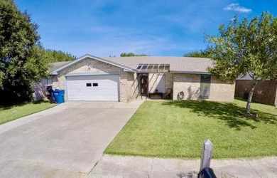 Welcome to this 3-bedroom, 2-bath home located in the desirable - photo 1