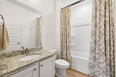 Located on a builder-designated premium lot in the more private - photo 25