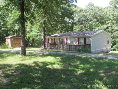 Lake Home For Sale in Warsaw, Missouri