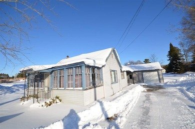 Lake Charlevoix Home For Sale in East Jordan Michigan