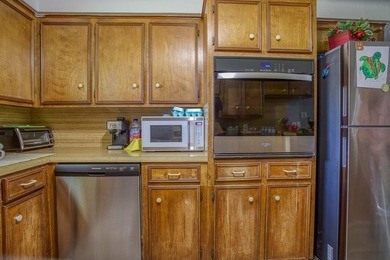 This spacious three-bedroom home features four-sided brick, a - photo 11