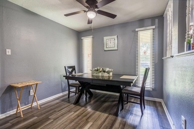 This spacious three-bedroom home features four-sided brick, a - photo 13