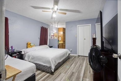 This spacious three-bedroom home features four-sided brick, a - photo 14