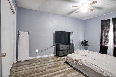 This spacious three-bedroom home features four-sided brick, a - photo 17