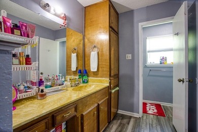 This spacious three-bedroom home features four-sided brick, a - photo 19
