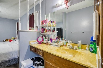 This spacious three-bedroom home features four-sided brick, a - photo 20