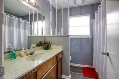 This spacious three-bedroom home features four-sided brick, a - photo 21