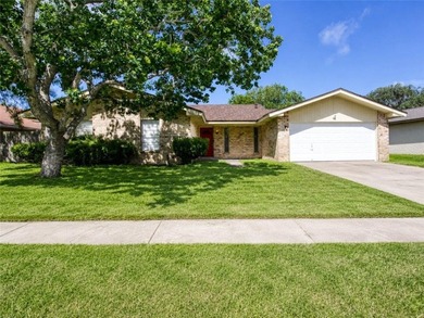 This spacious three-bedroom home features four-sided brick, a - photo 22