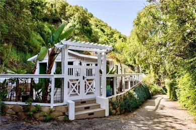 Tucked into the serene, tree-lined canyon setting of Laguna - photo 2