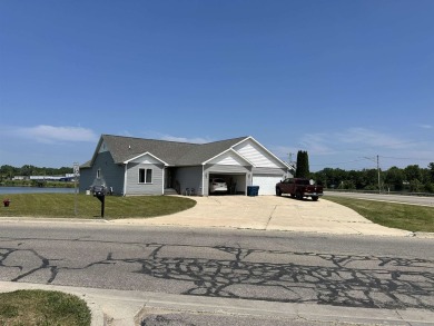 Lake Townhome/Townhouse For Sale in Beaverton, Michigan