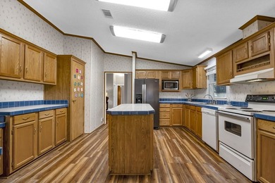 WATERVIEW with a 30x40 shop on a large corner lot! This newly - photo 21