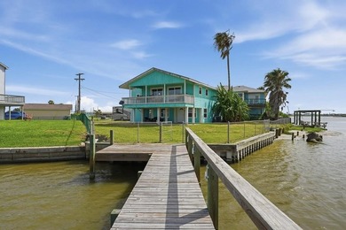 Waterfront opportunity in Copano Cove! Perfectly situated on the - photo 1