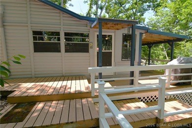 Lakefront cabins like this are getting harder and harder to - photo 11