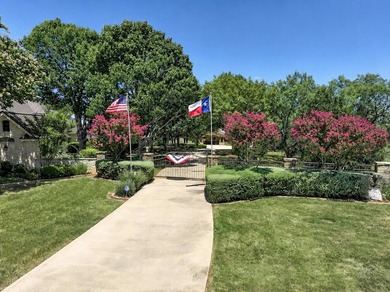 Set beyond a private gated entrance atop 3.2 acres spanning two - photo 1