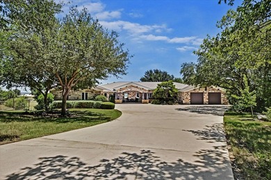 Set beyond a private gated entrance atop 3.2 acres spanning two - photo 3