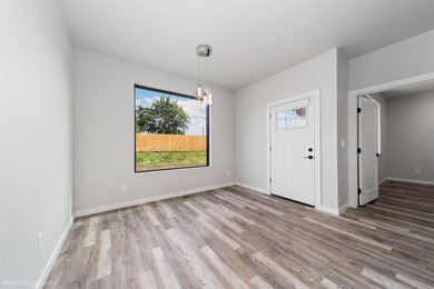 Modern ranch style one-story home with level entry. Built in