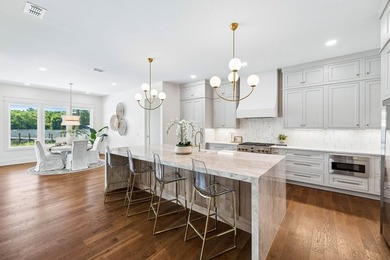 Welcome home to waterfront living on Eden Drive. This brand new - photo 15