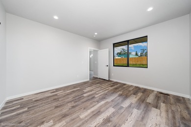 Modern ranch style one-story home with level entry. Built in