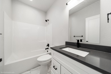 Modern ranch style one-story home with level entry. Built in