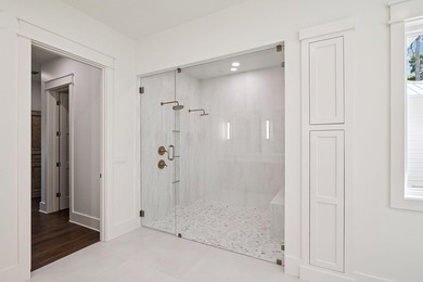Welcome home to waterfront living on Eden Drive. This brand new - photo 33