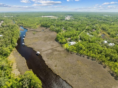 Welcome home to waterfront living on Eden Drive. This brand new - photo 41