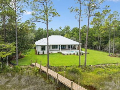 Welcome home to waterfront living on Eden Drive. This brand new - photo 49