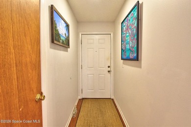 Lovely second floor condo tucked along the edge of lush - photo 5