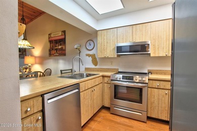 Lovely second floor condo tucked along the edge of lush - photo 7