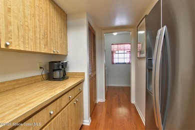 Lovely second floor condo tucked along the edge of lush - photo 8