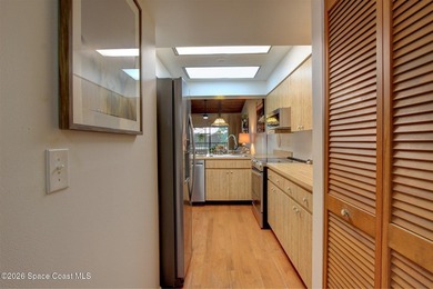 Lovely second floor condo tucked along the edge of lush - photo 9