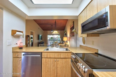 Lovely second floor condo tucked along the edge of lush - photo 10