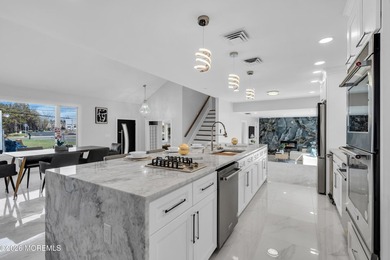 This fully renovated home sits on just under 2 acres with a pool - photo 14