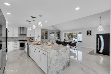This fully renovated home sits on just under 2 acres with a pool - photo 15