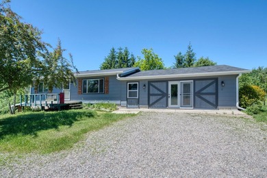 This country home is situated in a private setting just minutes - photo 27