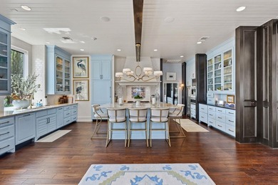 Nestled along the coveted waterfront on Lighthouse Drive in - photo 9