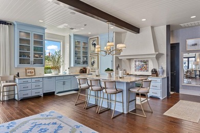 Nestled along the coveted waterfront on Lighthouse Drive in - photo 10