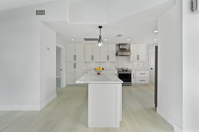 Beautifully renovated waterfront home in Beau Rivage with ocean - photo 10