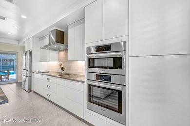Waterfront Navigable Pool Home! Welcome to this lovely modern - photo 2