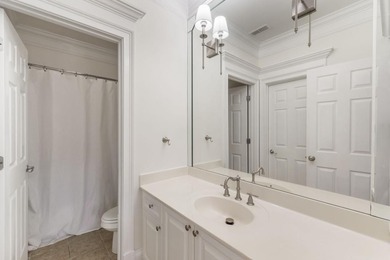 This highly appointed and updated Druid Hills townhome with