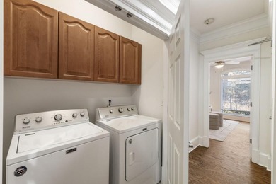 This highly appointed and updated Druid Hills townhome with