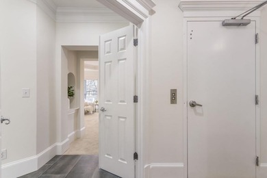 This highly appointed and updated Druid Hills townhome with