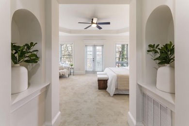 This highly appointed and updated Druid Hills townhome with