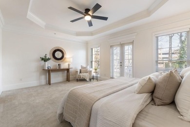 This highly appointed and updated Druid Hills townhome with