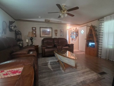 Discover peaceful living near the water with this 2-bedroom - photo 3
