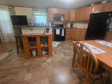 Discover peaceful living near the water with this 2-bedroom - photo 8