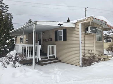 Lake Charlevoix Home For Sale in Charlevoix Michigan