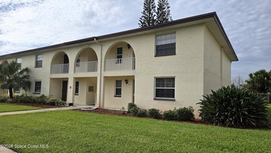 Live within walking distance to a pristine beach in this - photo 1